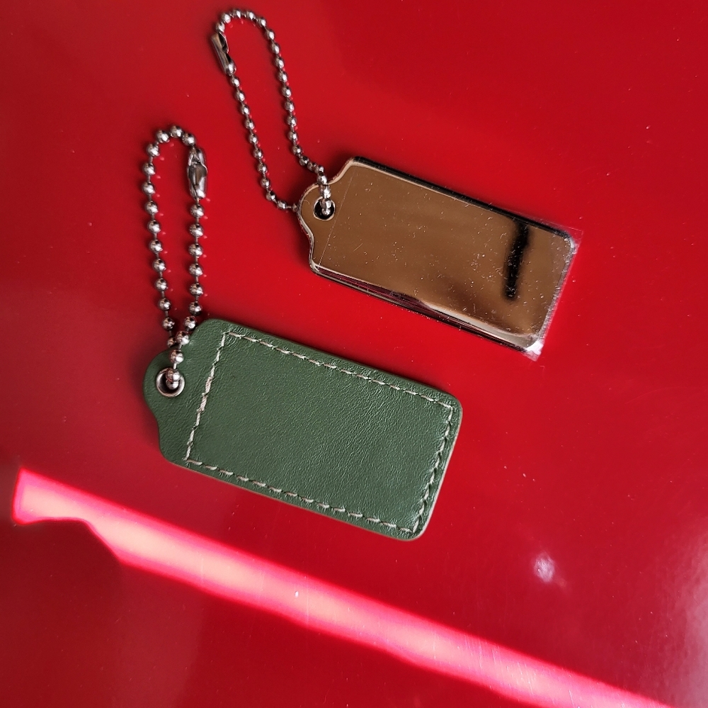Authentic Coach Leather Key Fob Tag and heavy silver coach key fob tag.